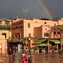 Hermann, Jutta and Marion with a rainbow on the Place des Ferblantiers